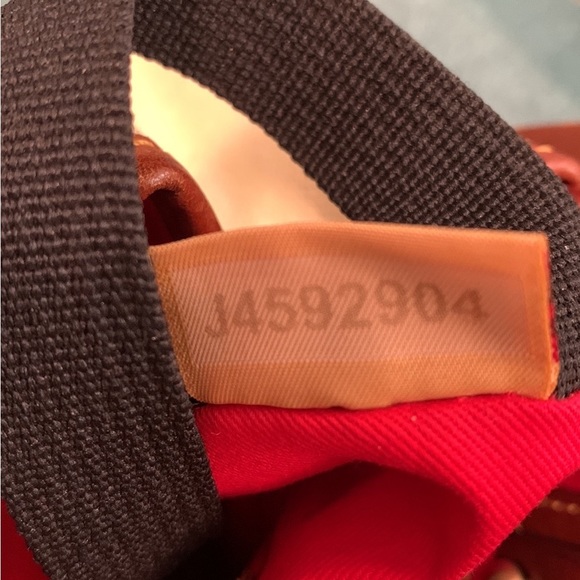 Dooney & Bourke Zebra Print Wilson Canvas & Leather Satchel - Picture 11 of 11